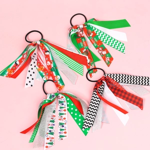 Lot de 4 chouchous de Noël avec motifs Père Noël et rubans festifs colorés