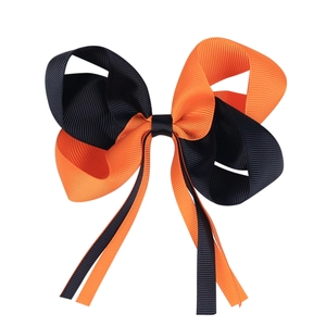Nœud pour cheveux Halloween noir et orange avec de longs rubans et une texture côtelée