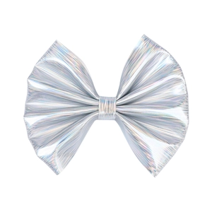 Macro shot of silver laser metallic texture on girl's bow hair clip with vertical pleats