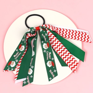 Élastique à cheveux de Noël avec rubans festifs, motifs Père Noël et texte Merry Christmas