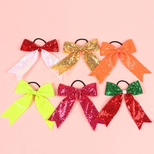 Set of 6 sequin bow hair ties for girls in vibrant assorted colors for parties