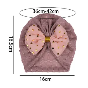 Tableau des tailles pour bonnet turban bébé rose avec nœud à paillettes dorées