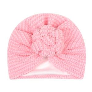 Bonnet turban rose pour bébé avec texture tricotée 3D et grande fleur décorative