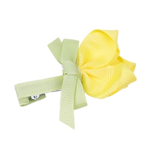 Vue détaillée de la pince à cheveux tulipe jaune et verte en ruban gros-grain doux