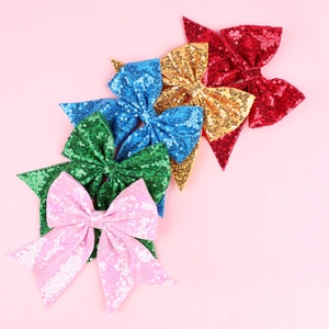 Detailed set of five glitter sequin bow hair clips in red gold blue green and pink colors