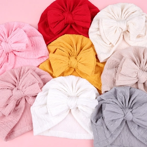 Lot de bonnets turbans pour bébé fille avec grands nœuds en huit couleurs douces variées