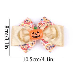 Détail d'un nœud papillon Halloween de 10,5 cm avec motif citrouille et ruban en satin