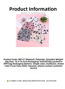 Detail of baby bow turban with butterfly print showing soft polyester material specs