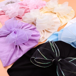 Adorable infant turban hats set with large lace double bows and silver stitched edges