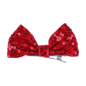 Detailed view of 4-inch red sequin bow hair clip with silver metal alligator grip