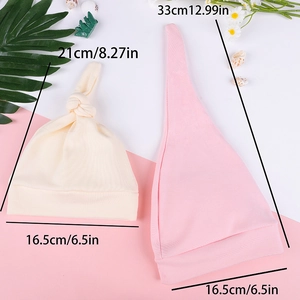Size specifications for newborn knotted beanie and long tail hat in soft ribbed cotton