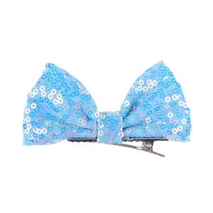 Detail of a 4-inch blue sequined bow hair clip with a silver metal alligator clasp
