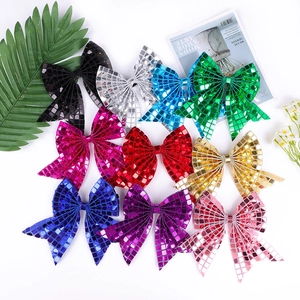 Sparkly sequin bow hair clips for girls in ten vibrant colors for holiday party and cheer