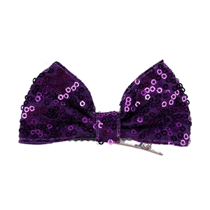 Detailed view of a 4-inch purple sequin hair bow clip with a silver metal alligator base