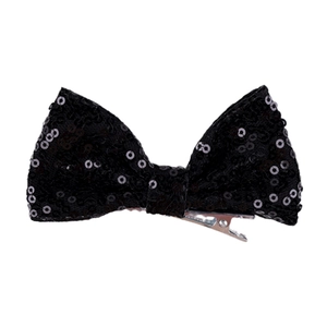 Detailed view of a 4-inch black sequin hair bow clip with a metallic alligator grip