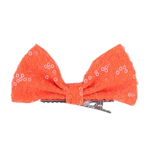 Detail of the 4-inch orange sequin bow hair clip with a durable silver metal alligator grip