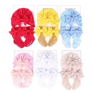Set regalo cappello turban e calzini per neonati con fiocchi in sei colori vivaci