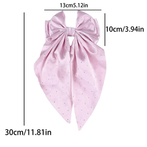 Nœud à cheveux rose en satin avec strass, mesurant 13 cm de large et 30 cm de long