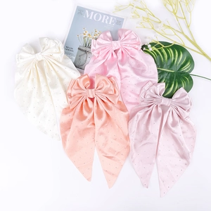 Détails des barrettes nœuds longs en satin avec strass en quatre couleurs pastels
