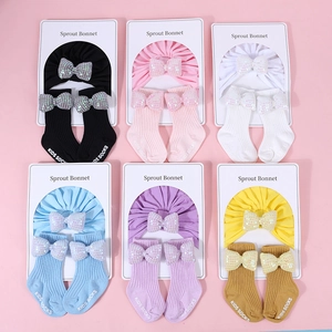 Set da 6 turbanti in cotone per neonati e calzini con fiocco in vari colori vivaci