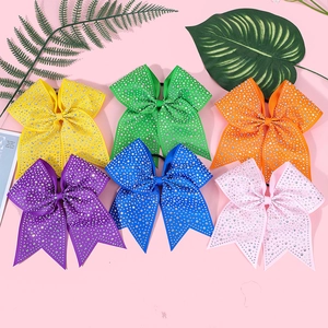 Detailed view of six colorful rhinestone hair bows for girls with high-elastic bands