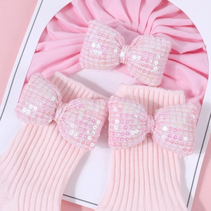 Set cappello turbante e calzini rosa per neonata con grandi fiocchi di paillettes scintillanti