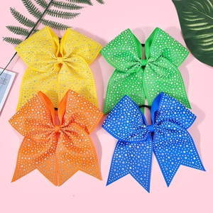 Detail of colorful bow hair ties with shimmering rhinestones and durable elastic bands
