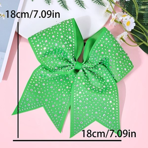 Detail view of a 7-inch bright green ribbon bow with sparkling rhinestones and textures