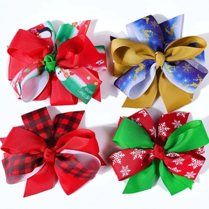 Set of 4 Christmas hair bows with snowman, reindeer, plaid, and snowflake ribbon patterns