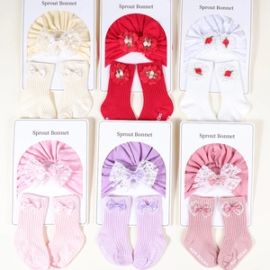 Cotton baby headband and socks set in various colors with lace bow and floral details