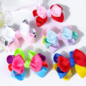 Handmade double-layered grosgrain ribbon bow hair clips in five colorful patterns