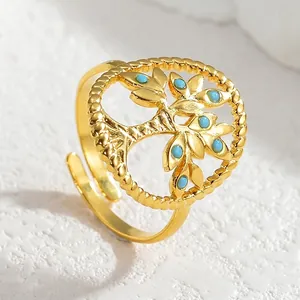 Adjustable gold Tree of Life open ring with light blue beads and twisted rope edge