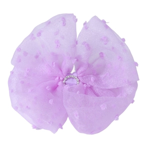 Detailed close-up of lavender bow hair clip with mesh polka dots and rhinestone center