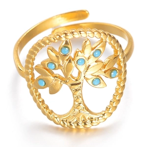 Close-up of golden Tree of Life open ring with blue stone inlay and bohemian details