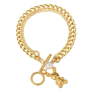 Double-layered golden bracelet with rabbit pendant, white pearl, and classic OT toggle clasp