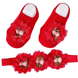 3-piece baby accessory set featuring red floral headband and matching knit socks with foot molds