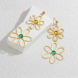 Elegant hollow daisy drop earrings in gold plated stainless steel with amber and green stones