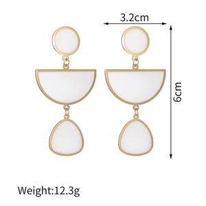 Detailed view of geometric drop earrings with dimensions of 3.2cm width and 6cm length