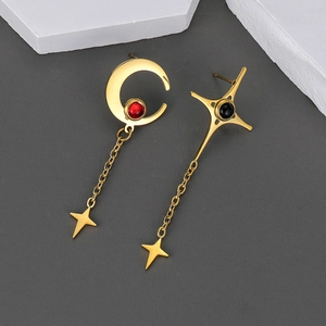 Vintage gold asymmetrical moon and star tassel earrings with red and black stones