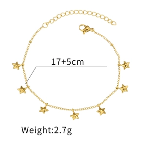 Detailed view of golden stainless steel star tassel bracelet with lobster clasp and chain