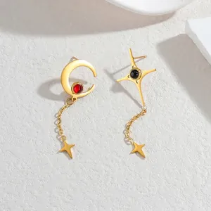 Vintage asymmetric tassel earrings with crescent moon and star charms in gold finish