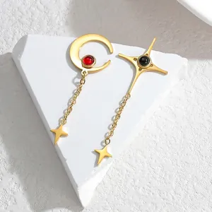 Vintage asymmetric tassel earrings with gold moon star charms and red black gems