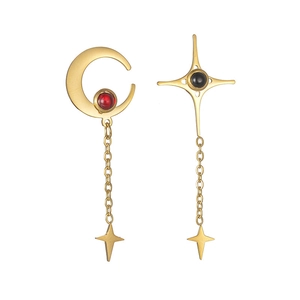 Vintage asymmetric gold tassel earrings with red moon and black star design