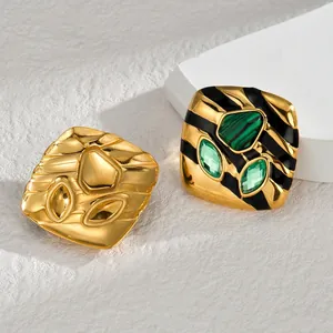Vintage asymmetric titanium steel square studs with green stones and black enamel