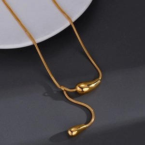 Minimalist titanium steel gold snake chain necklace featuring elegant teardrop pendants