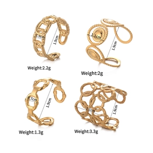 Detail view of four vintage geometric gold open rings with sizes and weights
