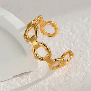 Close-up of a gold-plated titanium steel chain bracelet with textured hammered finish
