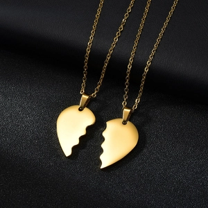 Polished gold stainless steel heart pendant necklace set for couples on black leather