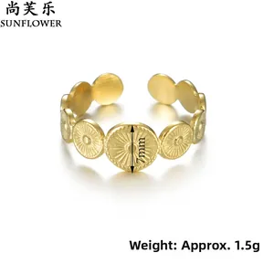 Detail of 7mm gold plated 14K vintage style open ring with circular relief pattern