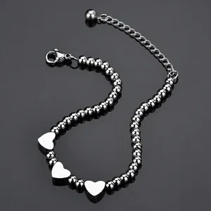 Polished silver titanium steel bead bracelet with three heart charms and adjustable chain